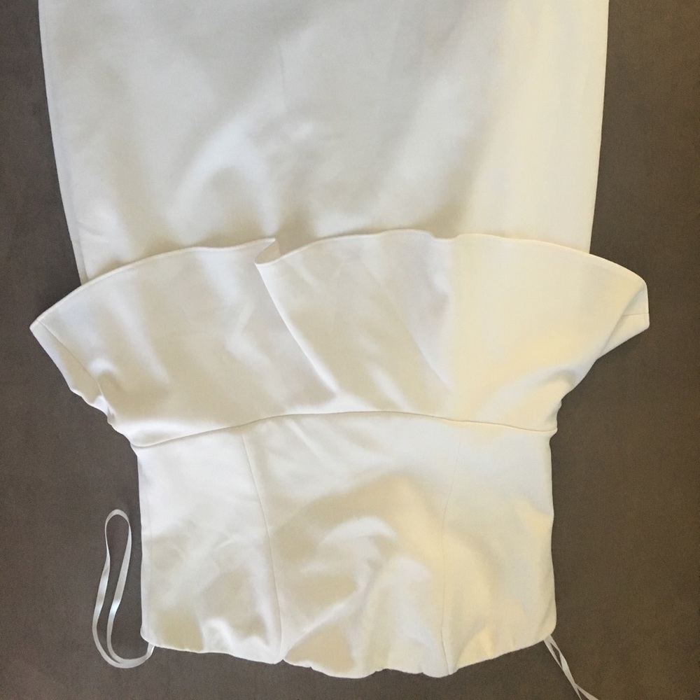 Strapless white peplum dress